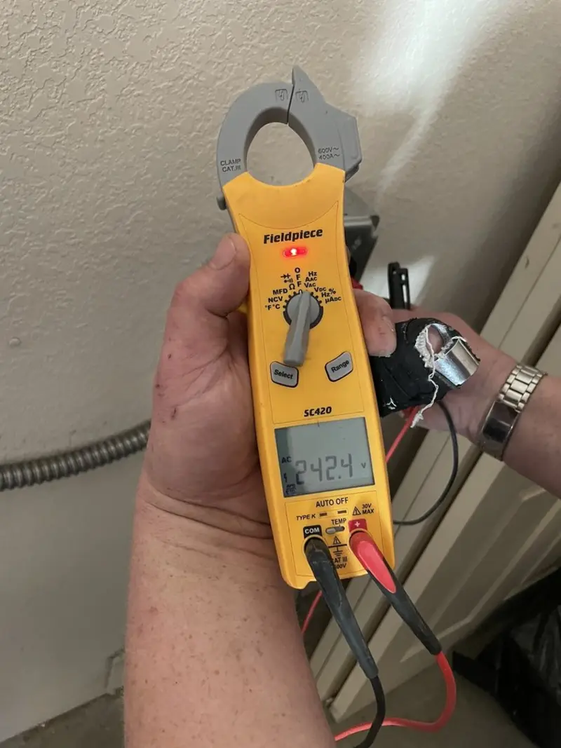 Voltage testing with clamp meter during Electrical Installation Services in Hialeah Gardens